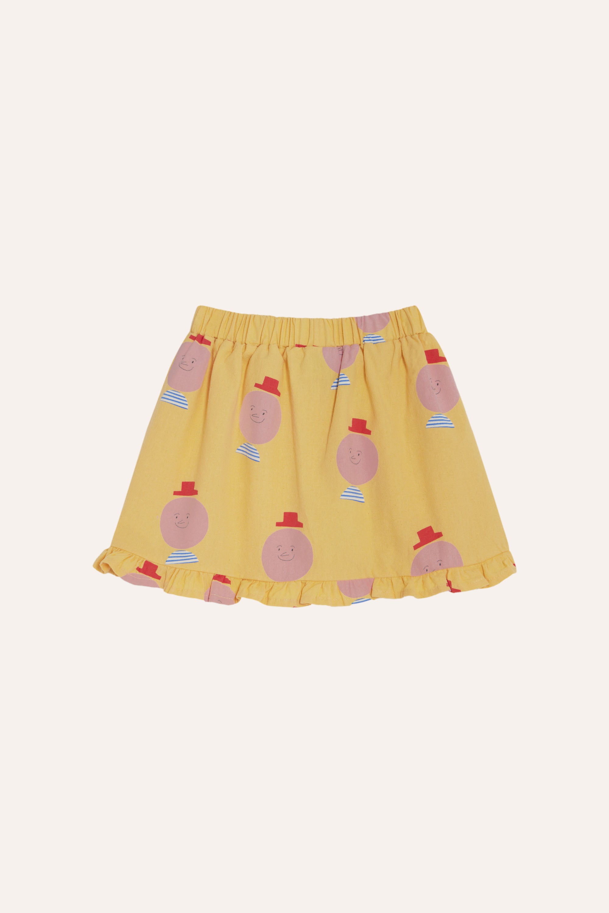 The campamento - kids - happy man yellow skirt