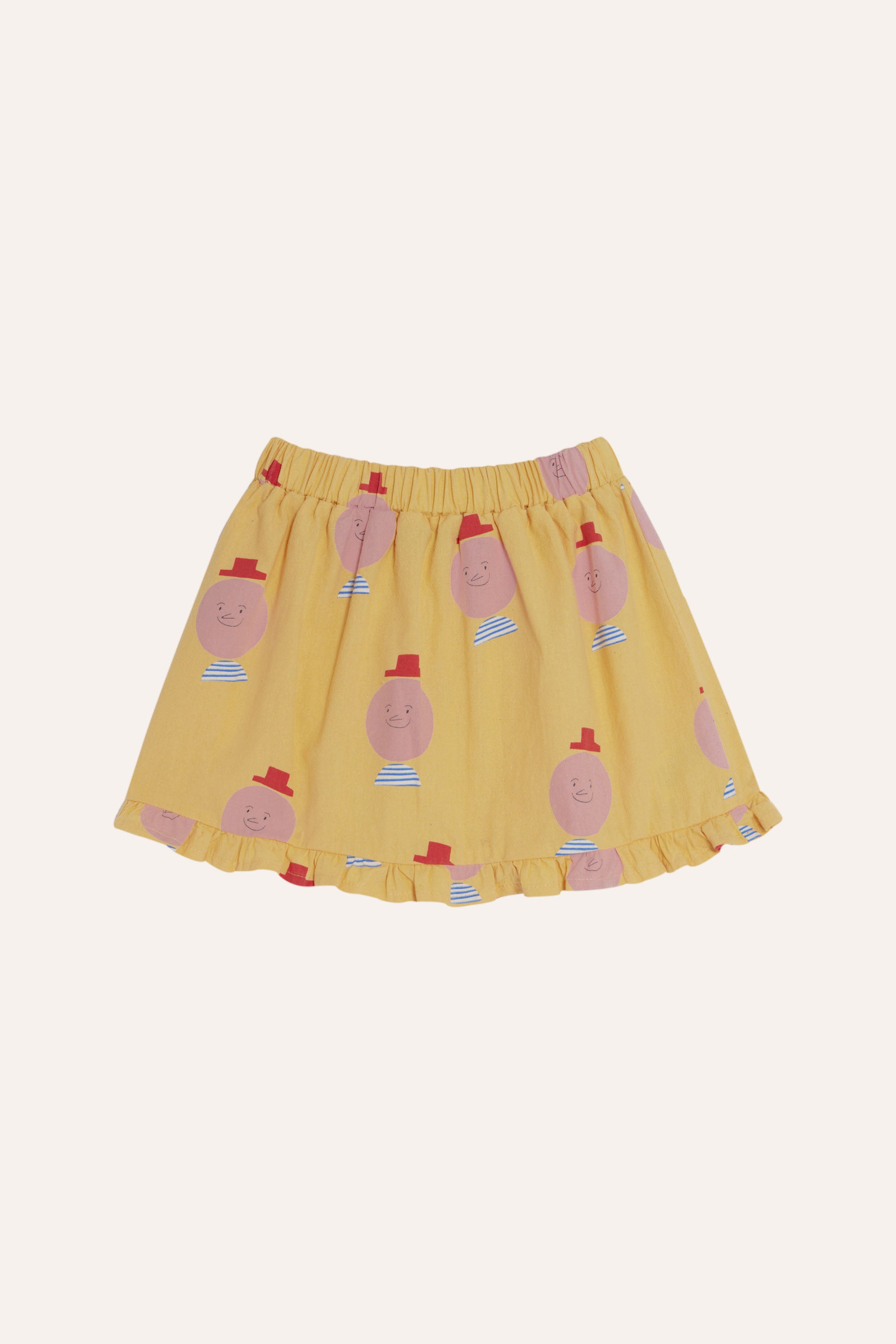 The campamento - kids - happy man yellow skirt