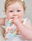January moon - rainbow sherbet teether clip