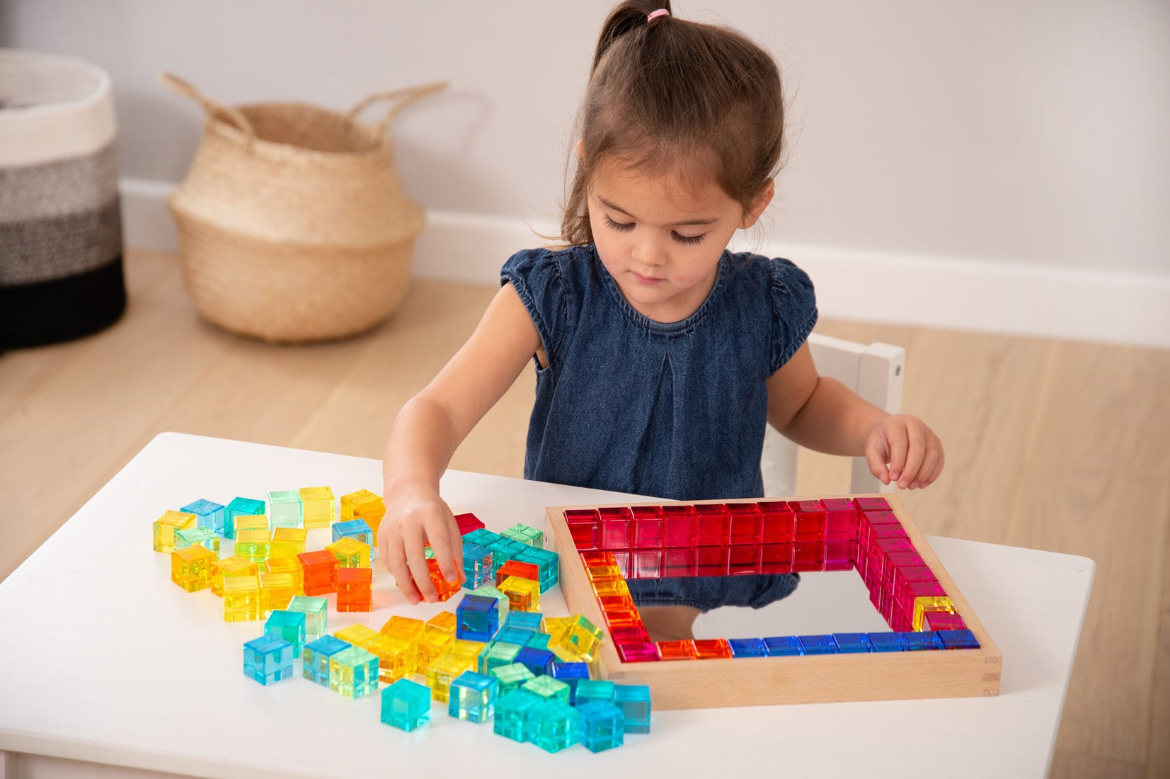 Sensory play - transparant gem cubes in tray