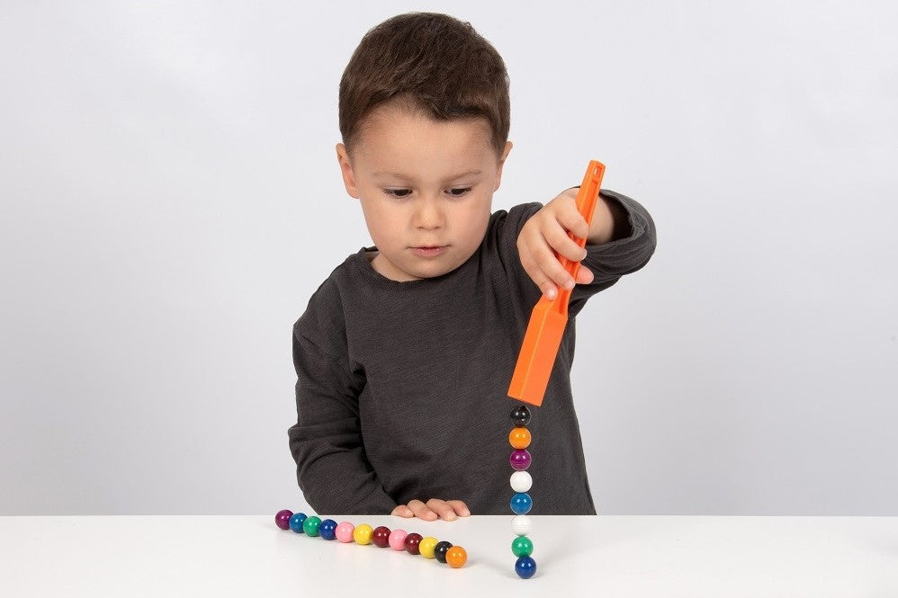 sensory play - magnetic colored marbles