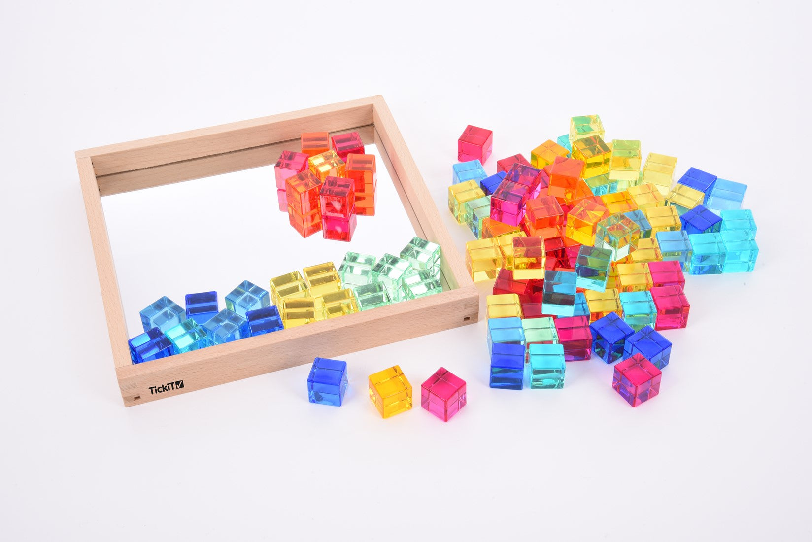 Sensory play - transparant gem cubes in tray