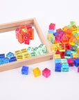 Sensory play - transparant gem cubes in tray