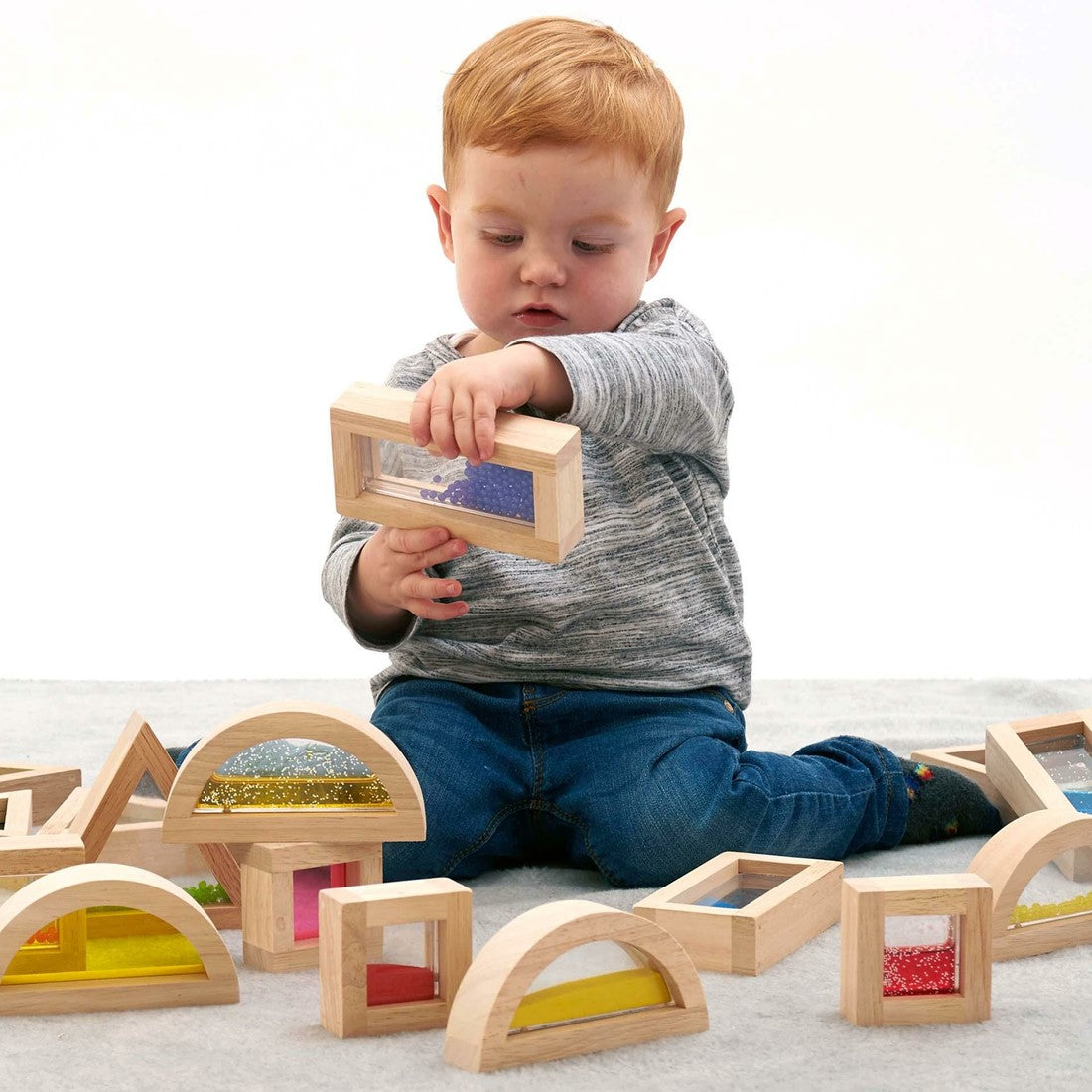 Sensory play - transparant wooden blocks